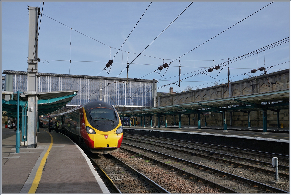 A Virgin Class 390 by his stop in Carlisle.
27.04.2018