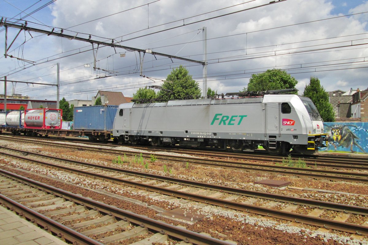 Akiem 186 184 hauls a container train through Antwerpen-Berchem on 29 June 2016.
