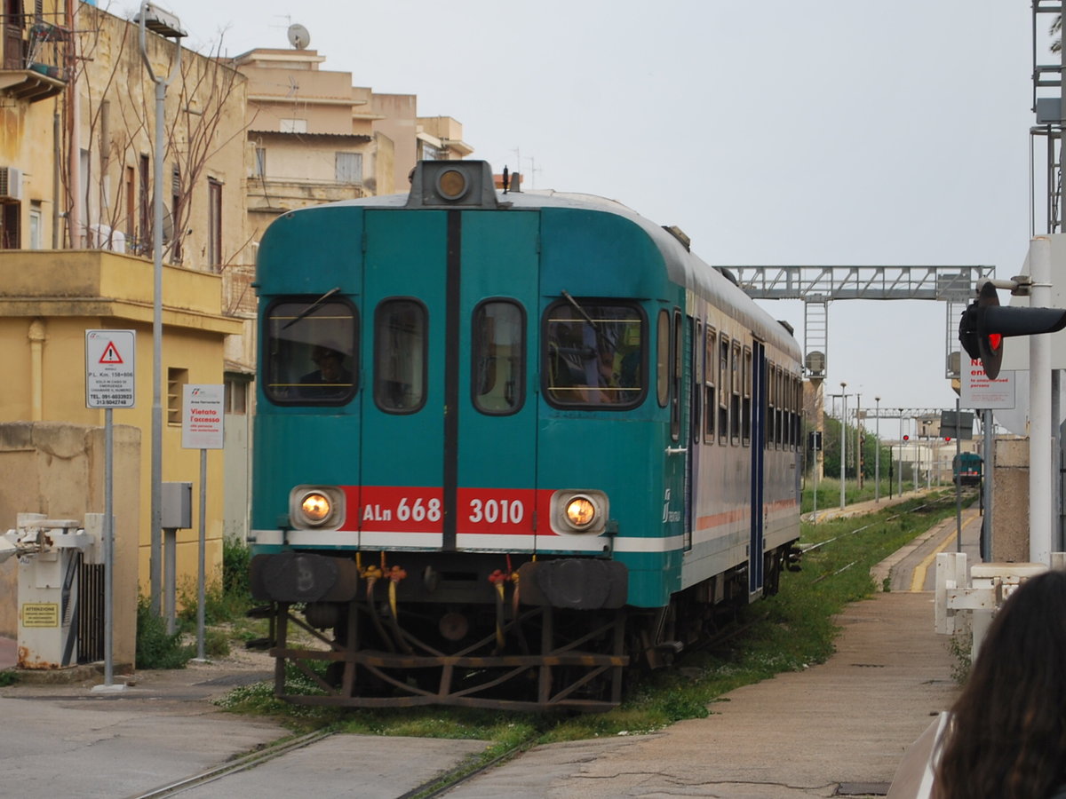 Aln 668 3010 DMU of Trenitalia leaving Marsala station bound for Trapani on April 1st, 2016.
