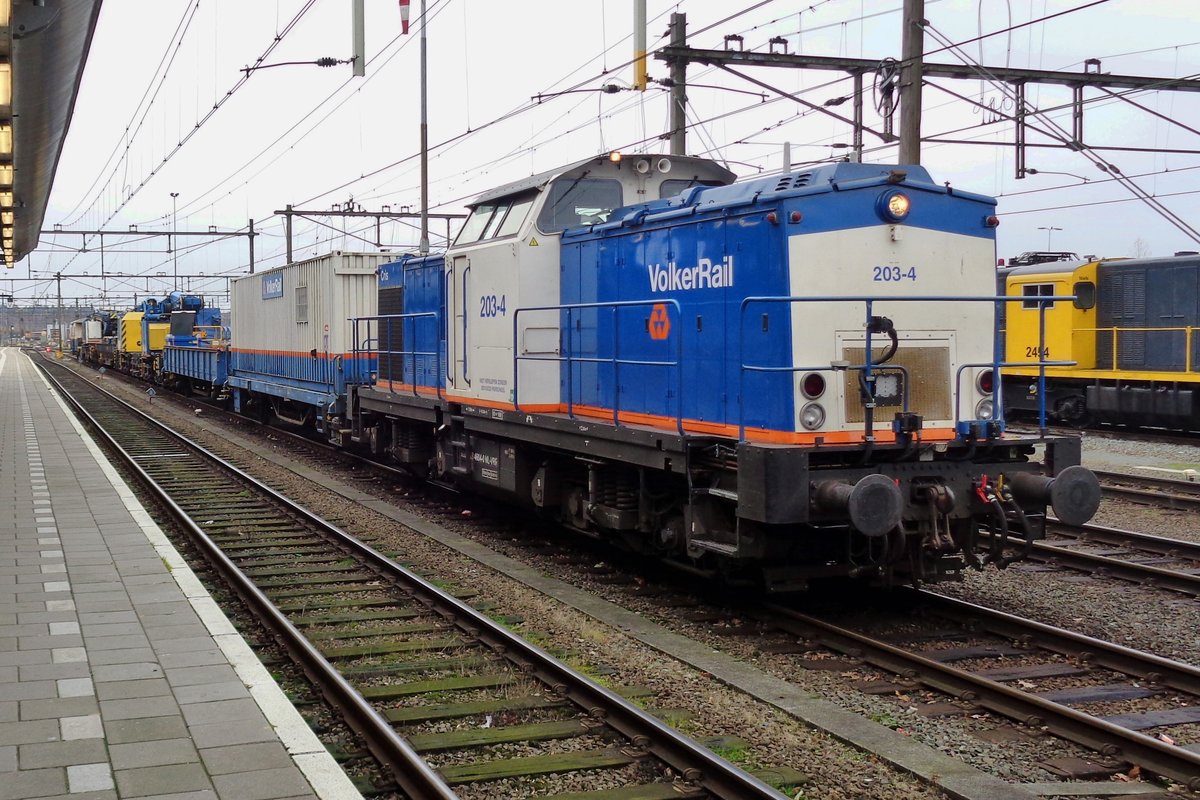 Amersfoort is an operations base of Strukton and Volker Rail, whose 203-4 is seen shunting at Amersfoort on 5 December 2018.