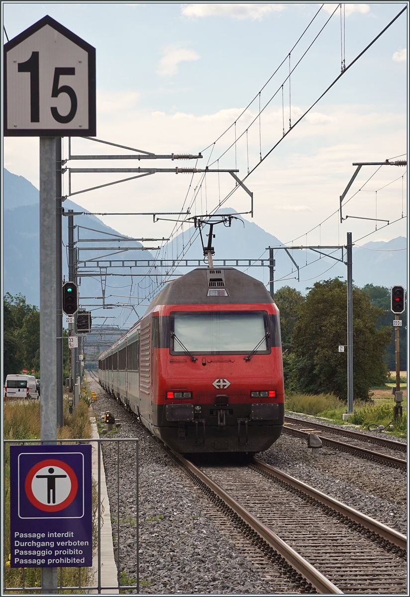 An SBB Re 460 is pushing its IR 90 towards Brig at Roche.

September 2, 2026