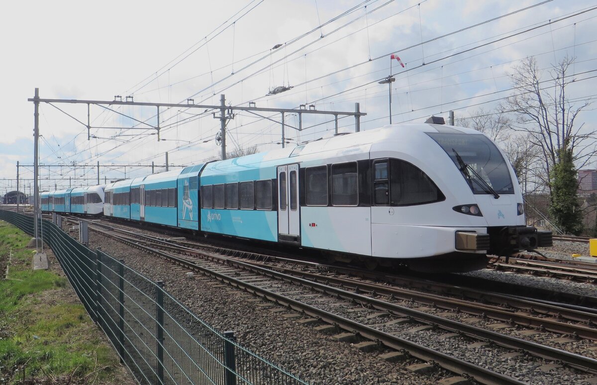 Arriva 322 enters Nijmegen on a grey 12 March 2022.