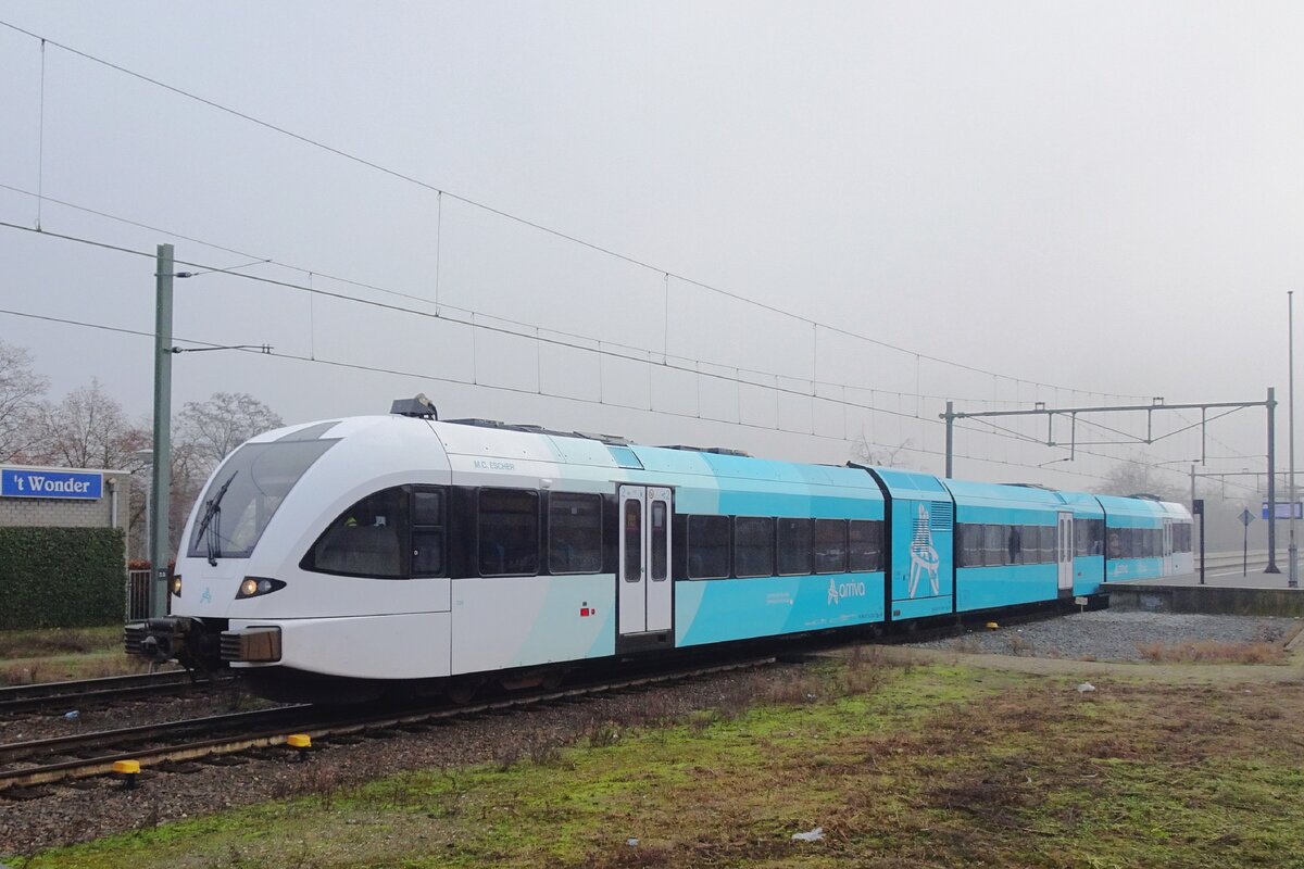 Arriva Friesland 326 shows the new colours for the northern concessions of Arriva at Blerick on 16 December 2021.