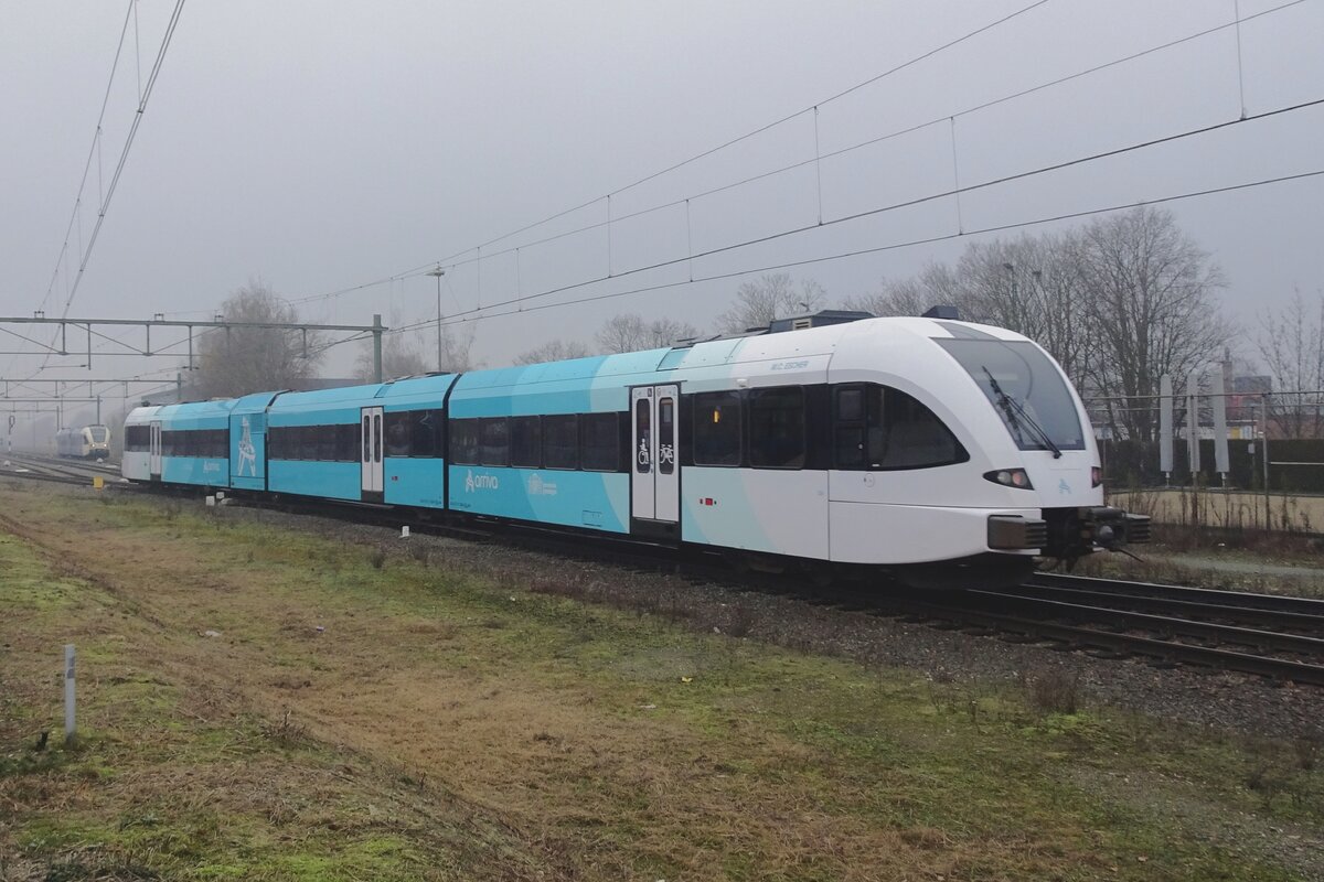 Arriva Friesland 326 shows the new colours for the northern concessions of Arriva at Blerick on 16 December 2021.