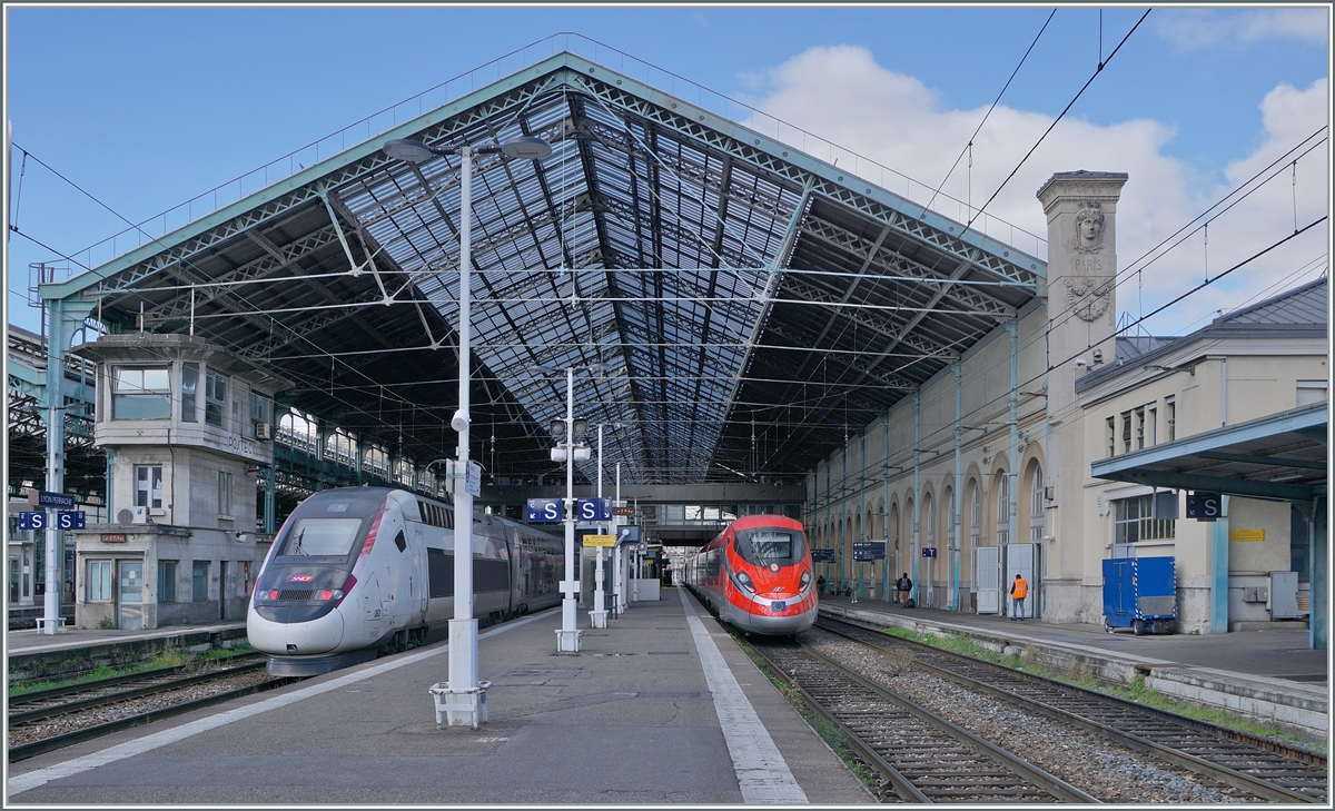 At Lyon Perrache station, the SNCF TGV 29 148 RAME 263 and the FS Trenitalia ETR 400 031 are waiting to depart for Paris Gare de Lyon.

March 13, 2024
