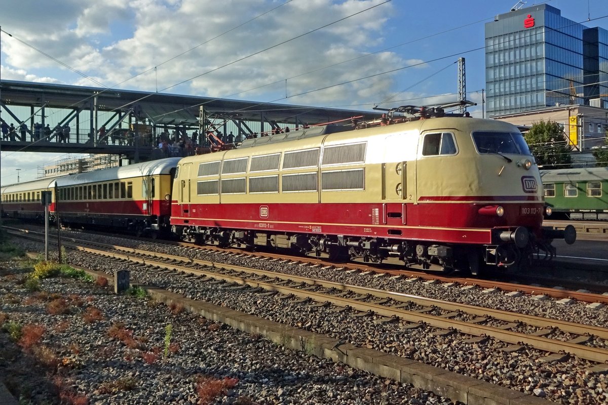 At the end of a nice day at Göppingen, DB Museum 103 113 banks a quasi TEE train out of Göppingen on 14 September 2019.