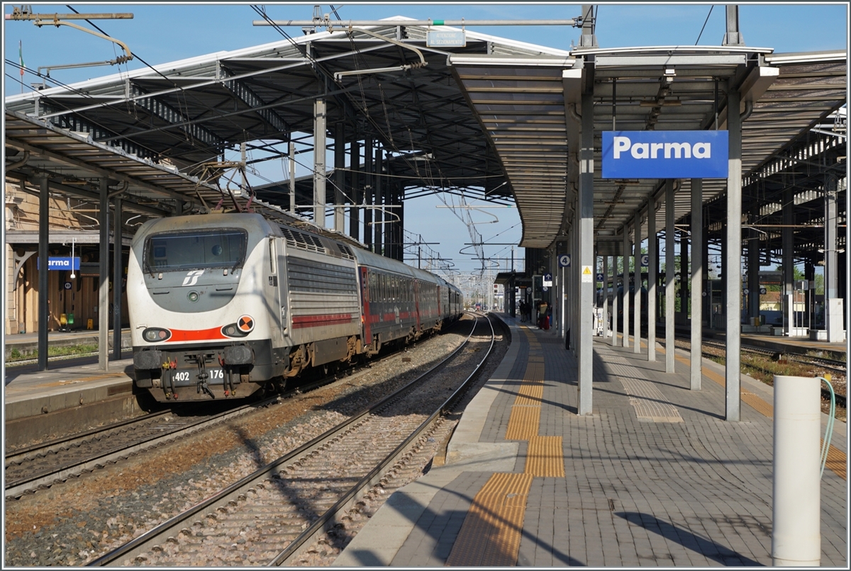 At the end of the night train from Sicily to Milano, the FS 402 pushes 176, which appears in the most beautiful morning light in Parma.

April 18, 2023