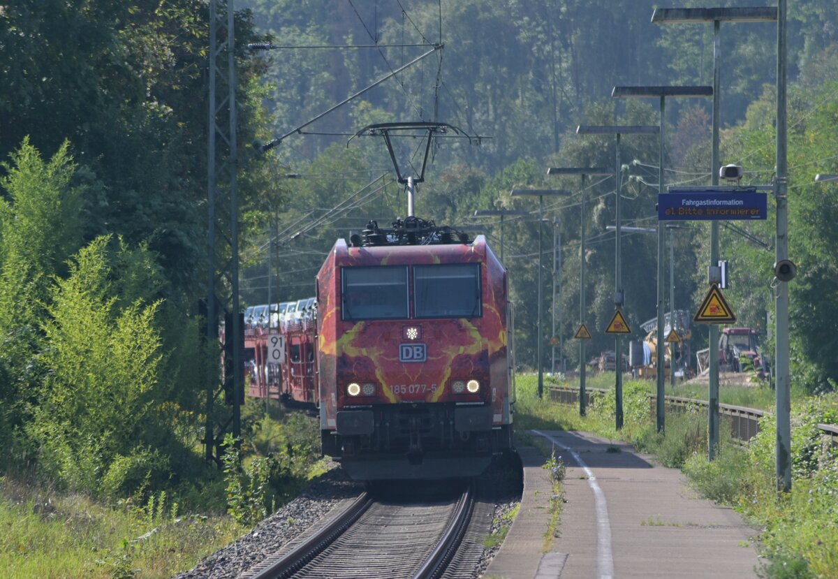 At the Station of Roigheim I'll catched class 185 077-5 with an train from the Mercedes Benz AG some cars are  open and the closed once are loaded with S-Class Mercedes and Maybach Cars. 2023.9.12