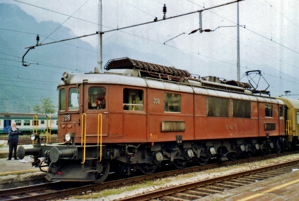 Back home. BLS 208 stands in Domodossola on 20 May 2006. Eight of these powerful beasts were orderen by BLS in two batches by Italian loco builder Breda. Until the 1990s these electrics were in revenue earning service and two, 205 and 208 have escaped the cutter's  torch.