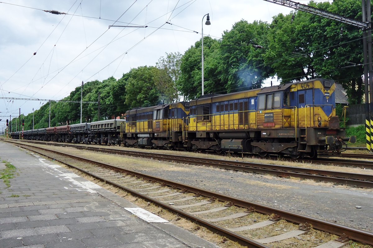 Ballast train with AWT  740 404 stands in Lovosice on 23 May 2015.