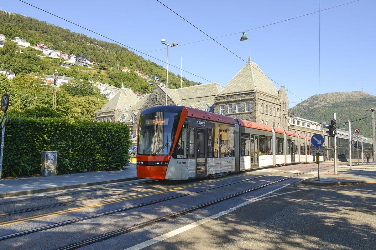 Bergen Light Rail tram 219 passing the Bergen Central Station.
Date: 11 July 2018.