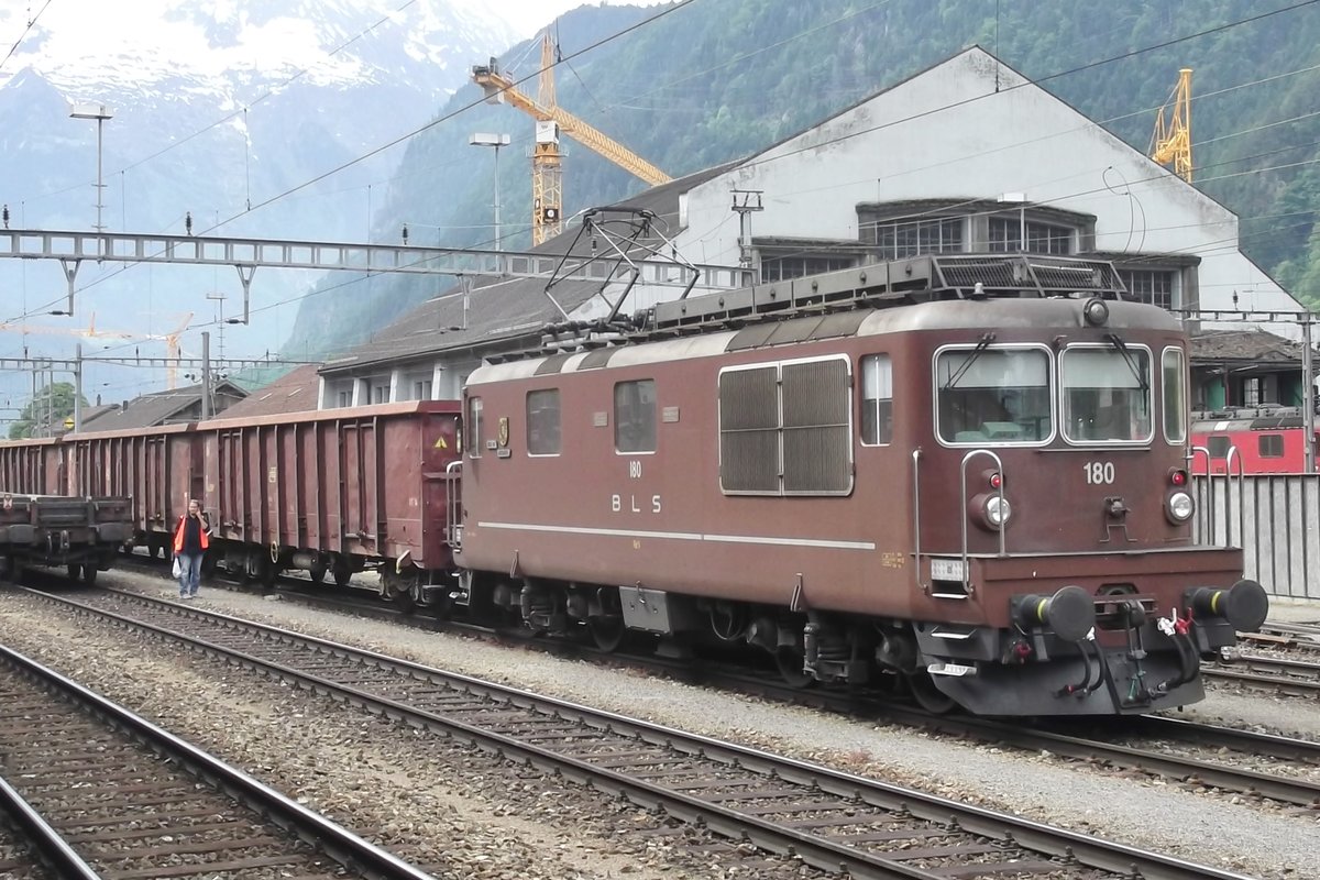 BLS 180 is about to bank a clay train out of Erstfeld on 4 JUne 2014.