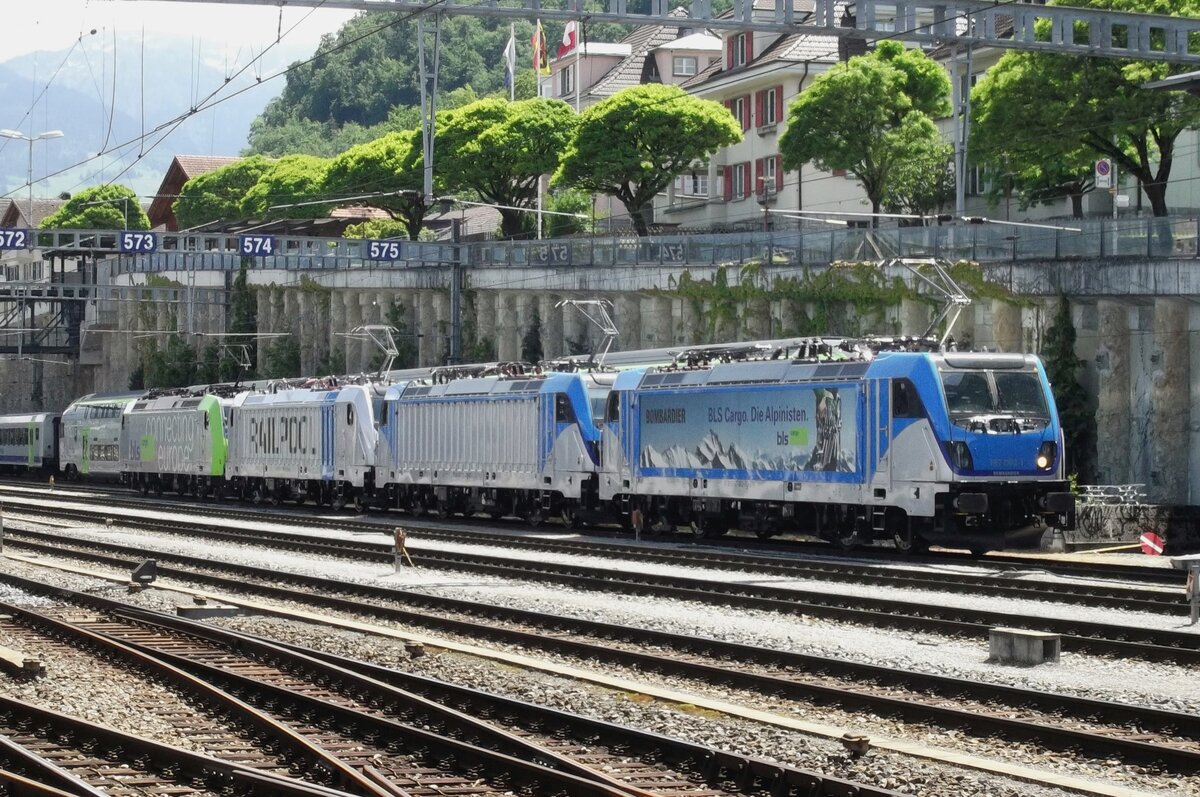 BLS 187 002 hauls a locomotive filled test train train through Spiez on 5 June 2014.