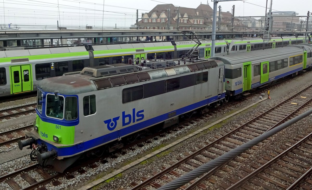 BLS, Ex-SBB Class 4/4 engine 501 stands at Spiez with also ex-SBB EW-III Swiss-Express stock.