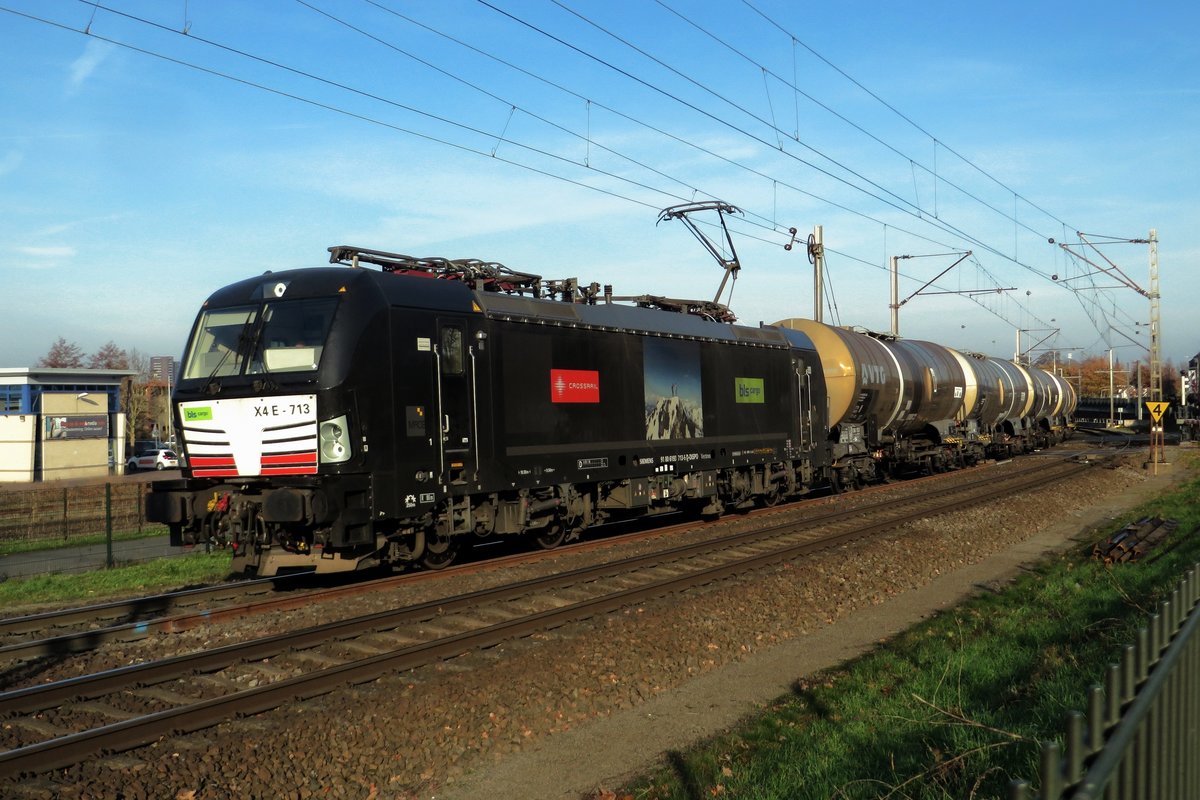BLS X4E-713 hauls a tank train through Venlo on 25 November 2020.
