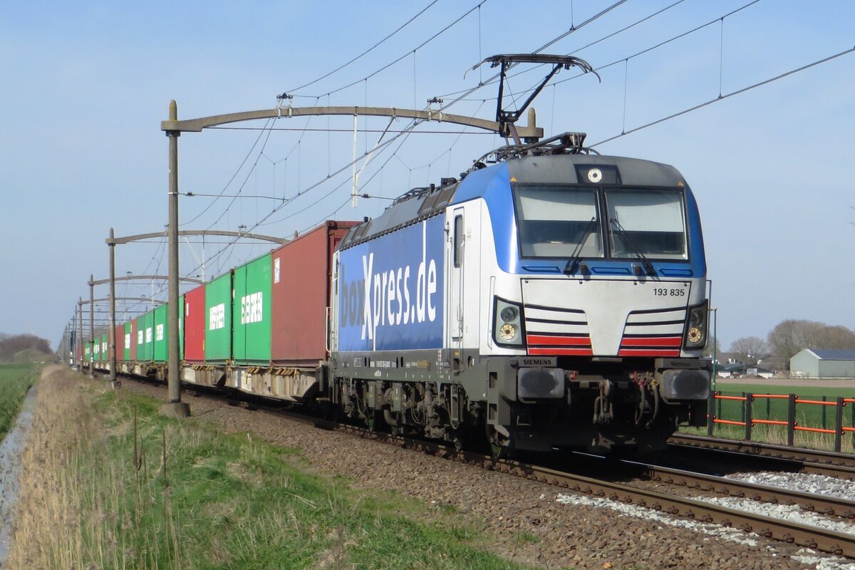 BoxXpress 193 835 hauls a container train to Munich through Hulten on 5 April 2023.