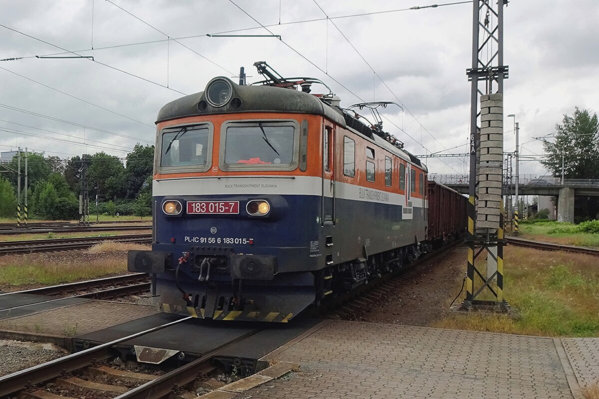 Bulk Transshipment Slovakia 183 015 hauls an empty coal train through Bohumín on a grey 24 August 2021.
