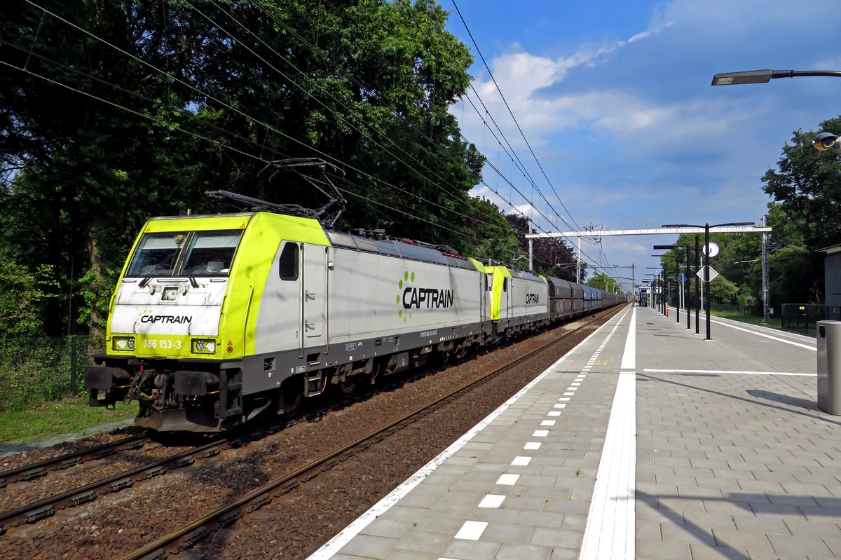 CapTrain 186 153 hauls a coal train through Tilburg Universiteit on 18 July 2020.