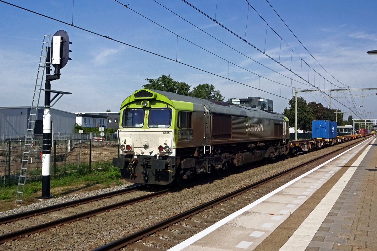 CapTrain 6605 speeds through Oisterwijk on 23 August 2019.