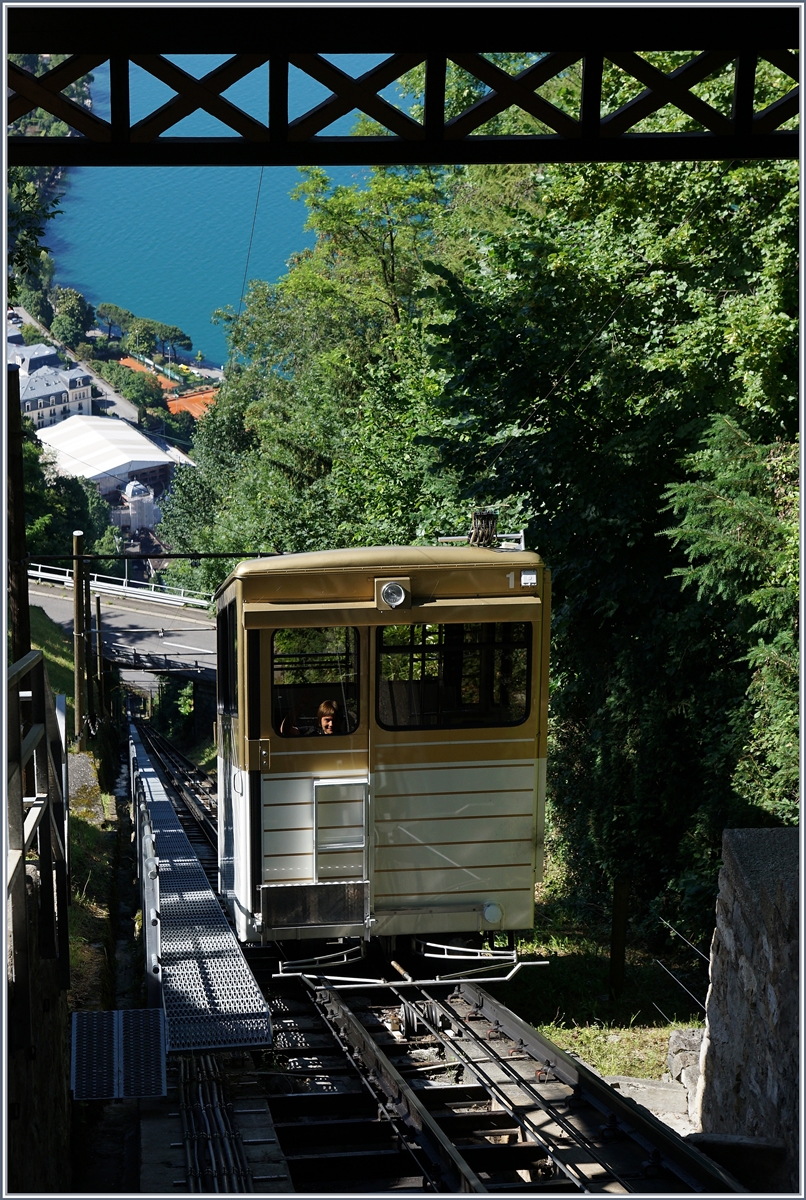 Car 1 of the Territet Glion funicular reaches its destination. The view down to the lake shows the height difference the funicular overcomes.

July 3, 2016