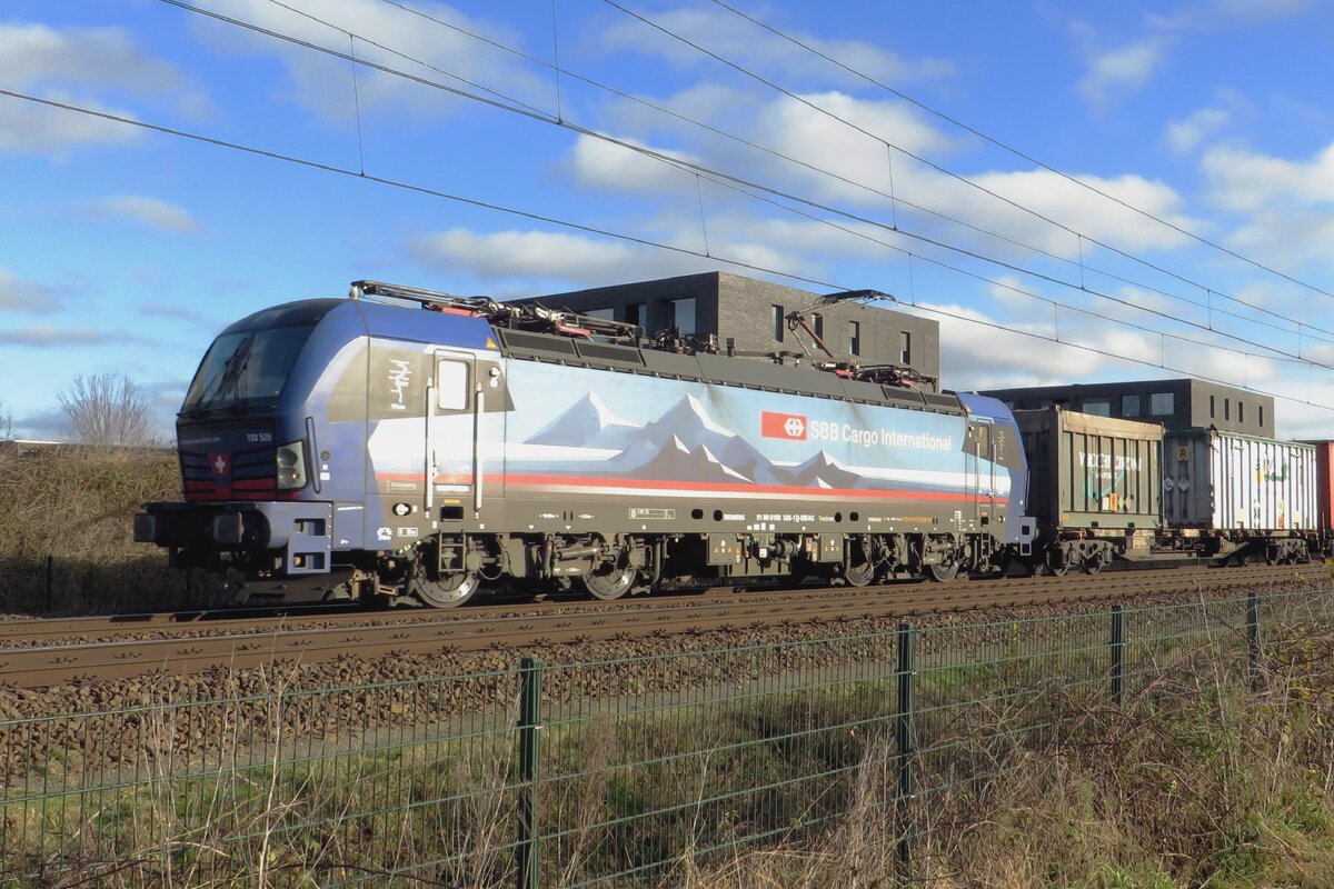 Catching the sun light in the flank, SBBCI 193 526 passes Tilburg-Reeshof on 8 December 2021.