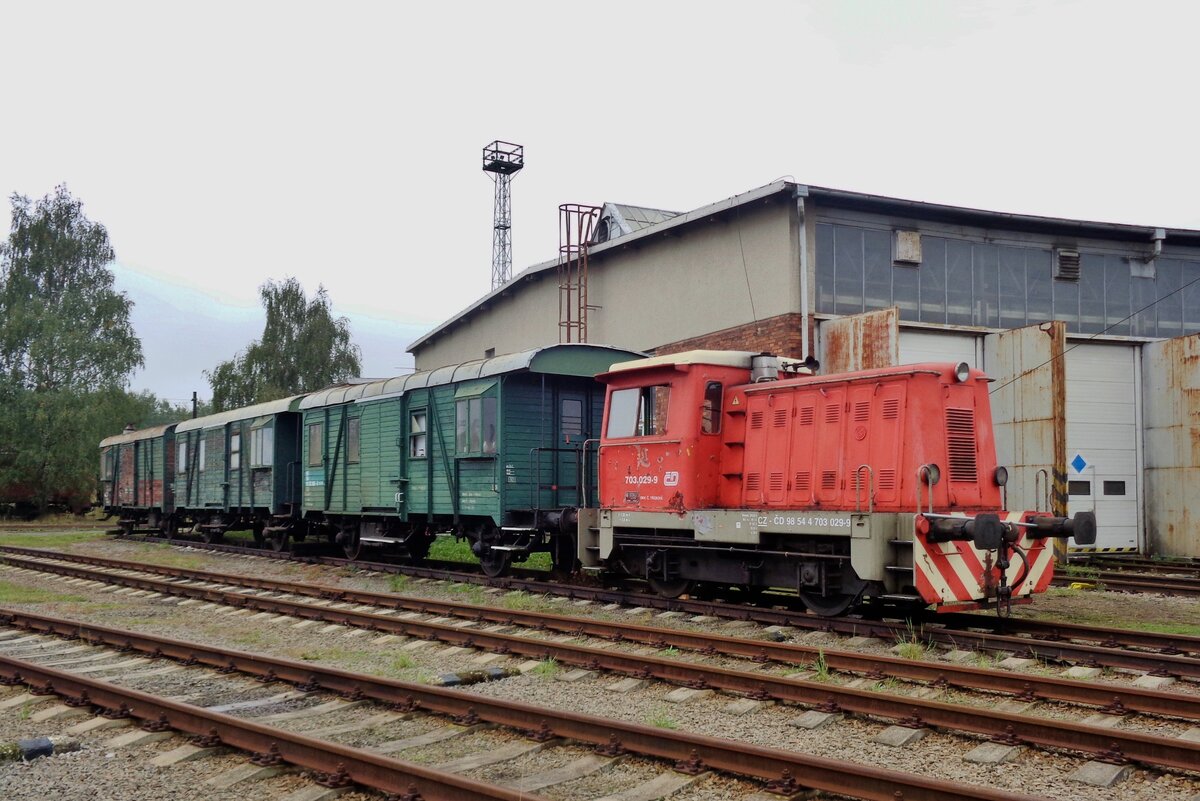 CD 703 029 stands with three old freight wagons at the CD work shops in  Ceska Trebova during an Open day on 24 September 2017.