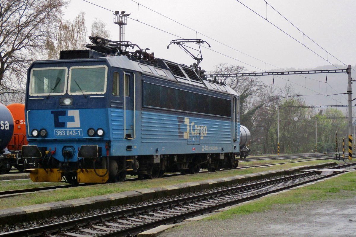 CD Cargo 363 043 stands at Decin-Vychod and catches the rain on 7 April 2017.