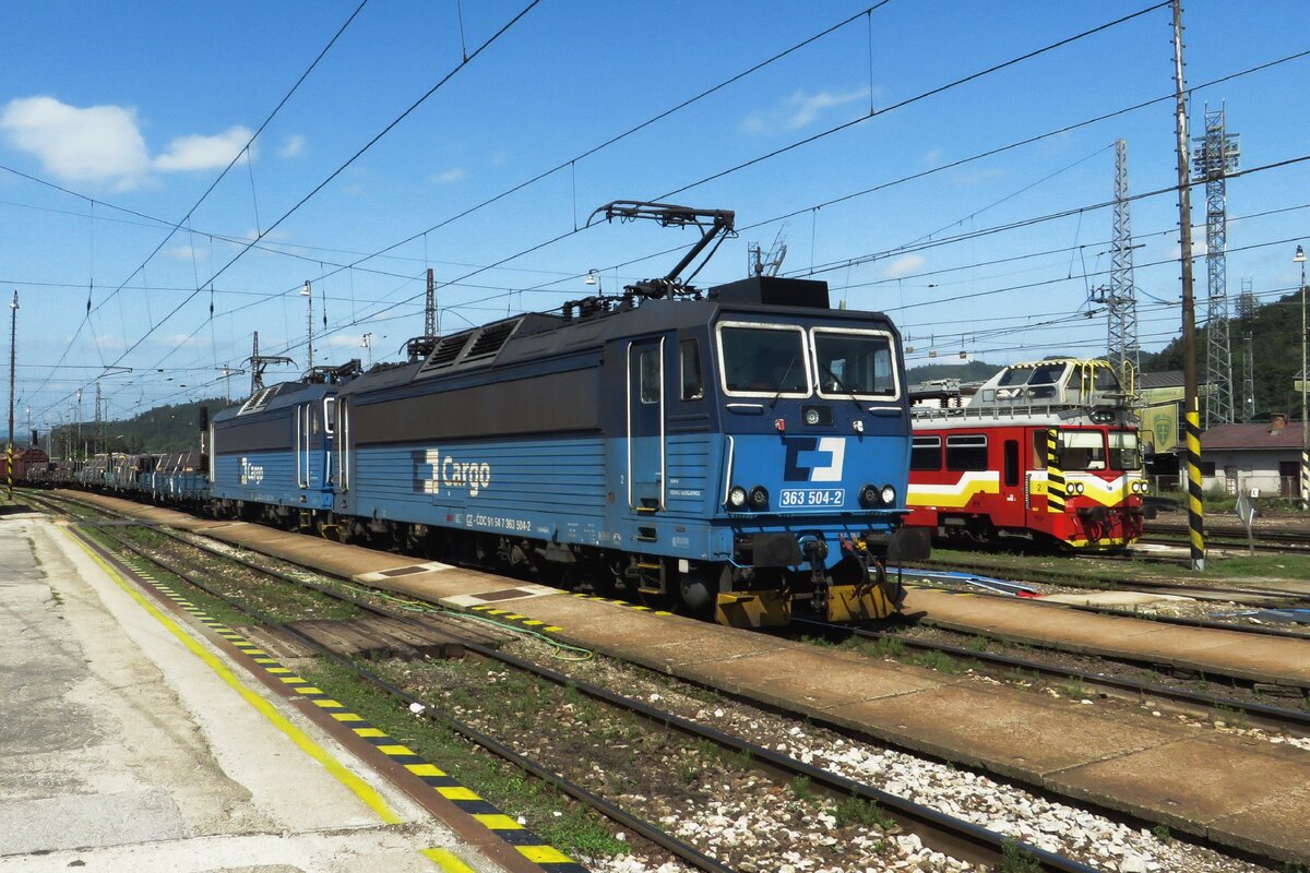 CD Cargo 363 504 hauls a mixed freight through Zilina on 25 August 2021.