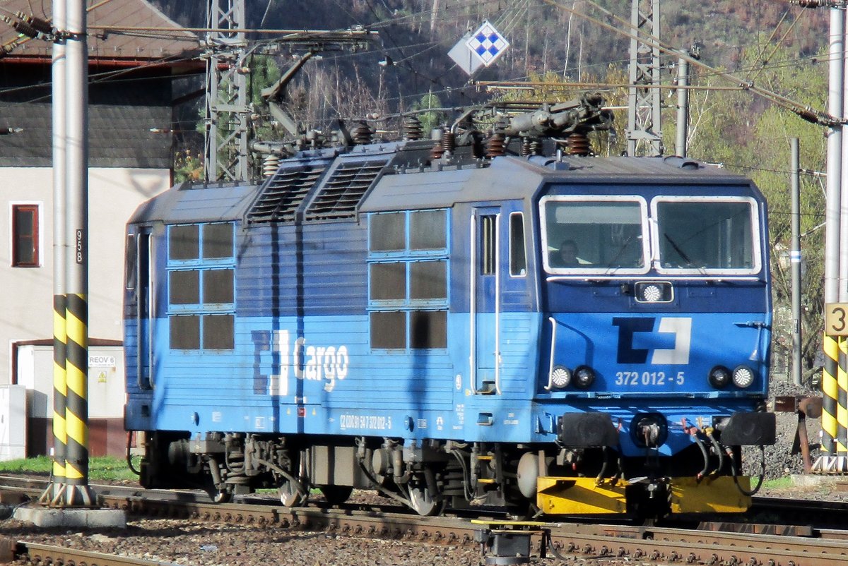 CD Cargo 372 012 runs light through Decin hl.n. on 6 April 2017.