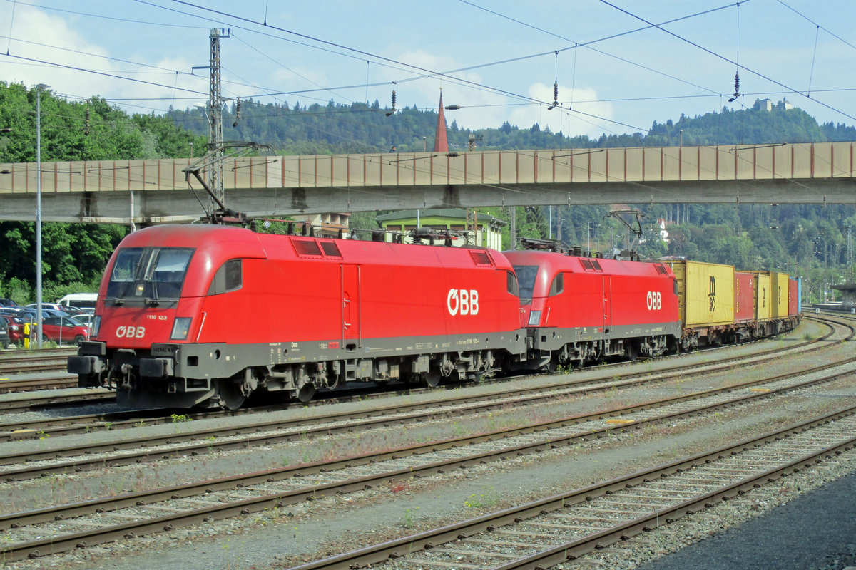 Container train with 1116 123 at the reins passes through Kufstein on 18 May 2018.