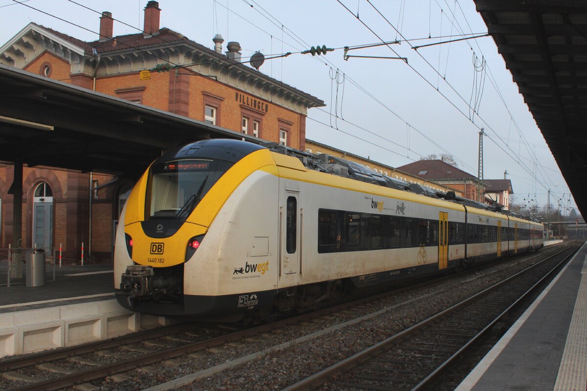DB 1440 182 stands ready for departure to Freiburg (Breisgau) via Titisee at Villingen on 15 February 2024.
