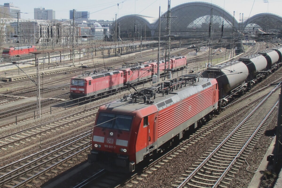 DB 189 017 hauls a cereals train through Dresden Hbf on 7 April 2018 and is to pass under the bridge of the Budapester STrasse, a well known vantage point for train spotters.