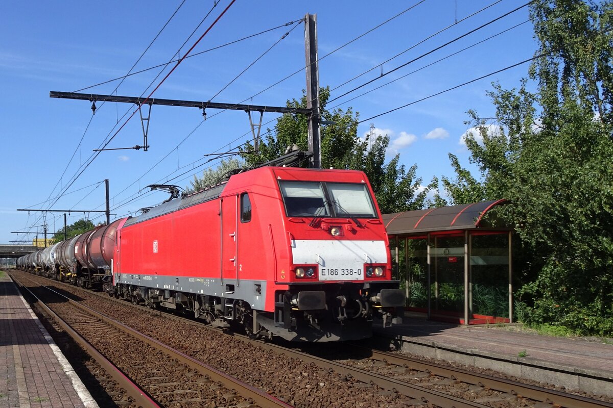 DB cargo 186 338 hauls a freight through Antwerpen-Noorderdokken on 14 July 2022.