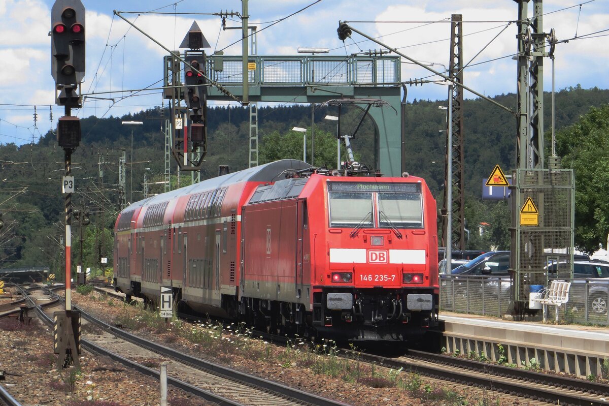 DB regio 146 235 pushes an RE to Plochingen out of Amstettem (Württemberg) on 9 July 2022.