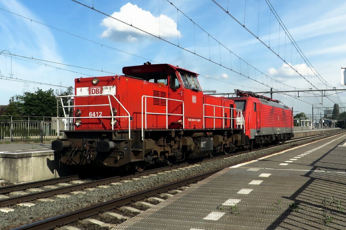DBC 6412 hauls a Class 189 through Blerick on 28 May 2021. 