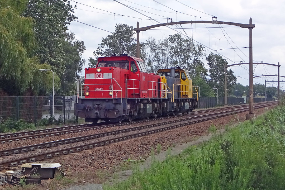 DBC 6442 hauls a sister loco through Hulten on 16 August 2019.