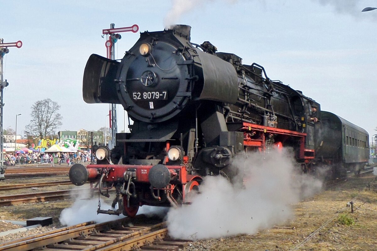 DDR-modified Kriegslok 52 8079 lets off steam at Wolsztyn on 30 April 2016.