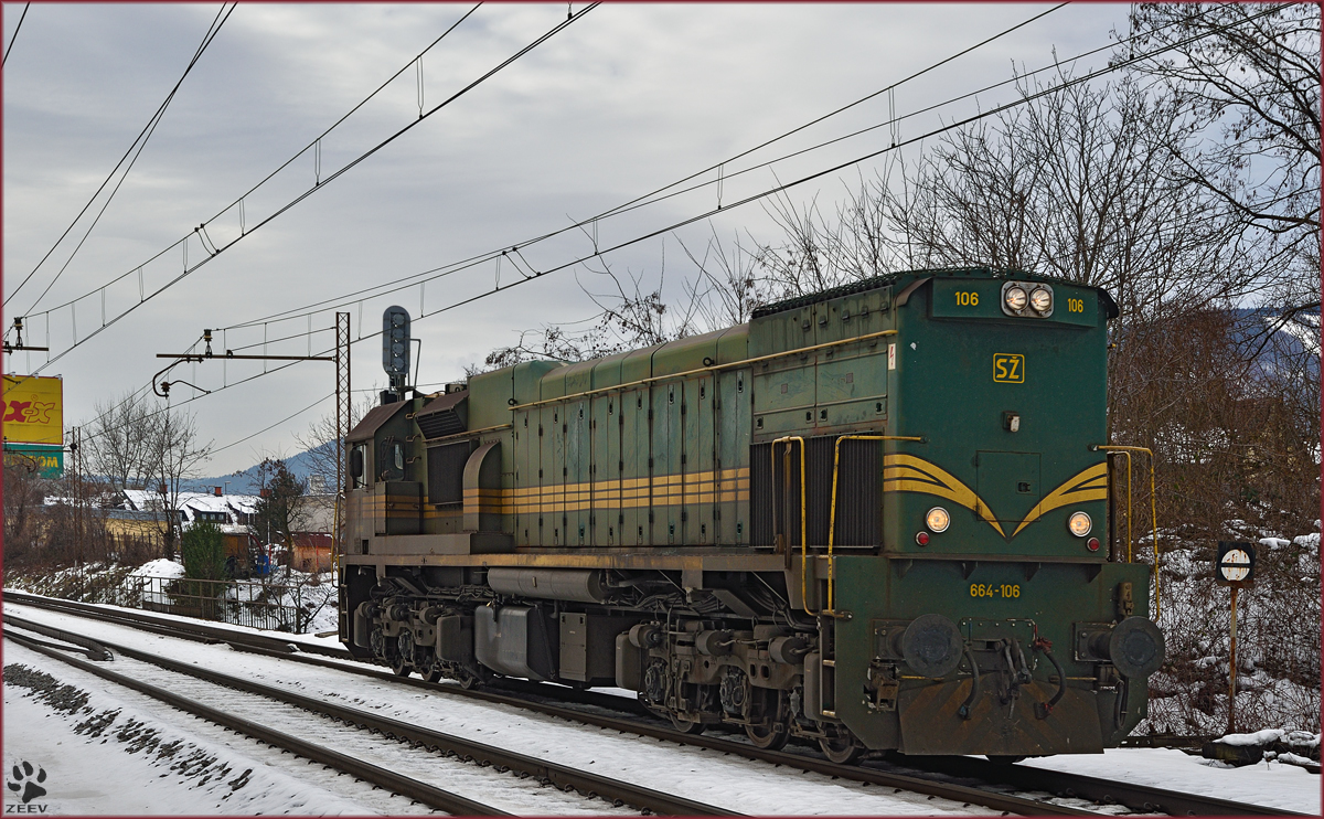Diesel loc 664-106 run through Maribor-Tabor on the way to Maribor station. /10.2.2015
