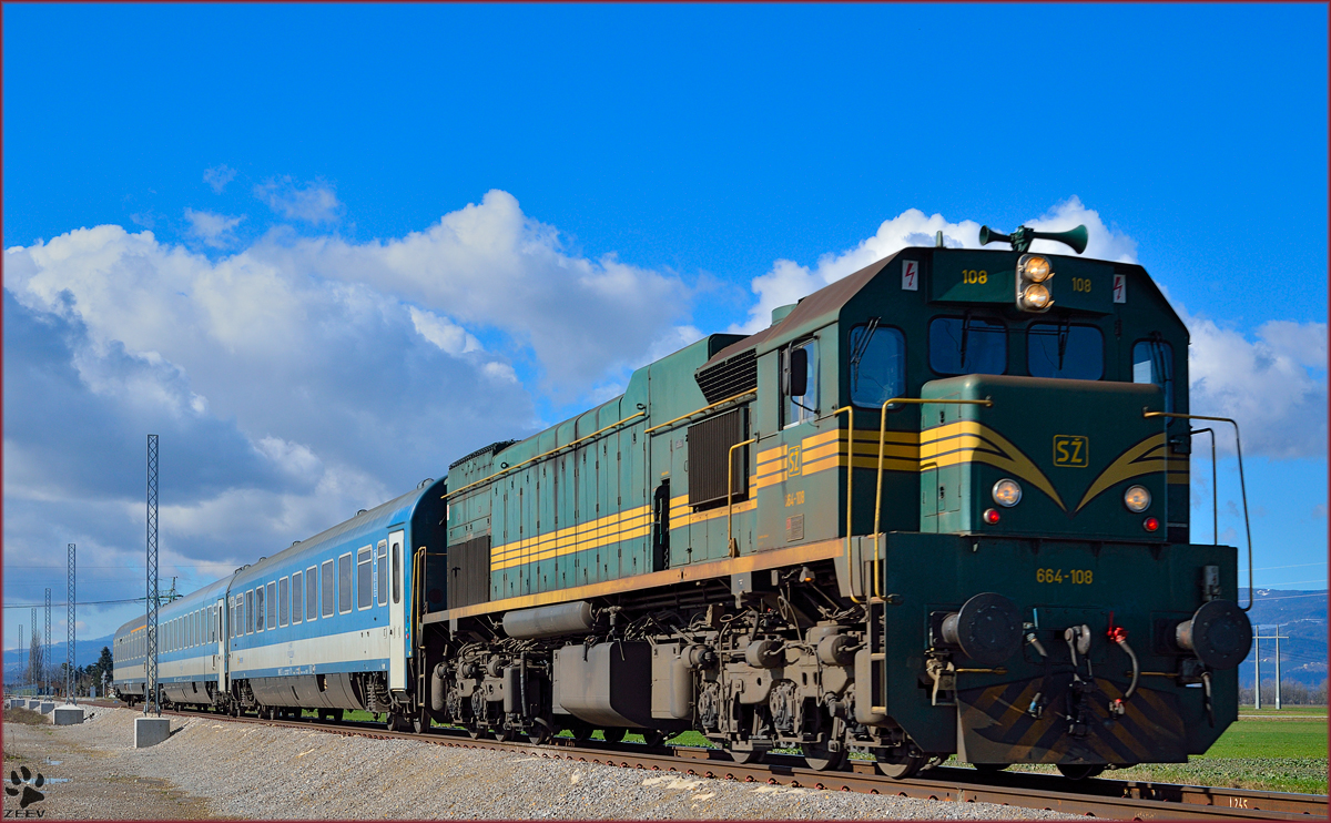 Diesel loc 664-108 pull MV247 'Citadella' through Cirkovce on the way to Budapest. /14.2.2014