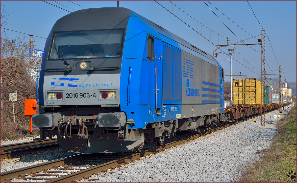 Diesel loc LTE 2016 903 'Maria' is hauling container train through Maribor-Tabor on the way to Koper port. /13.3.2014