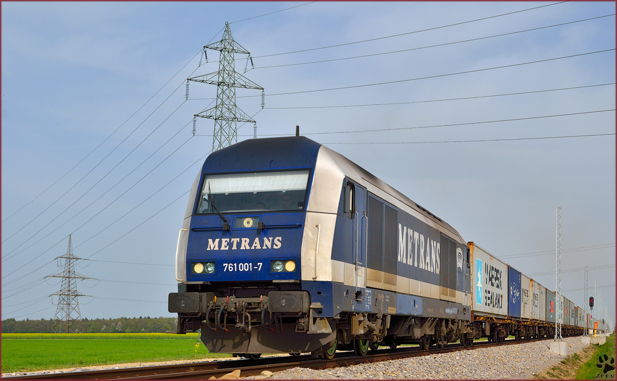 Diesel loc METRANS 761 001 is hauling container train through Cirkovce on the way to Koper port. /4.4.2014