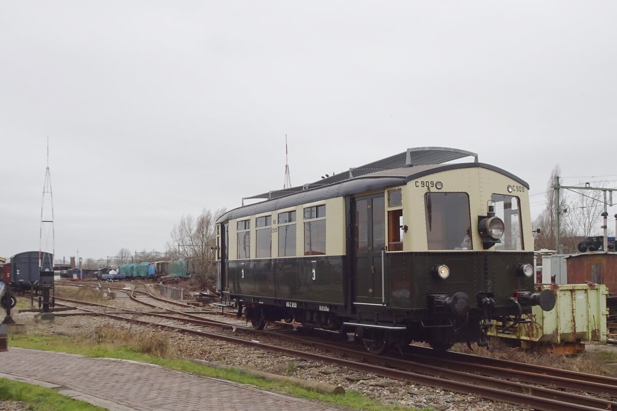 Diesel motor coach omC 909 runs through the area of the SGB at Goes on 18 February 2023.