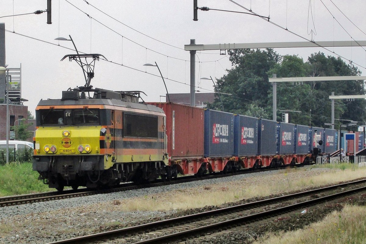 Diverted container train hauled by RRF 4401 speeds through Wijchen on 28 June 2016 and almost takes the photographer by surprise.