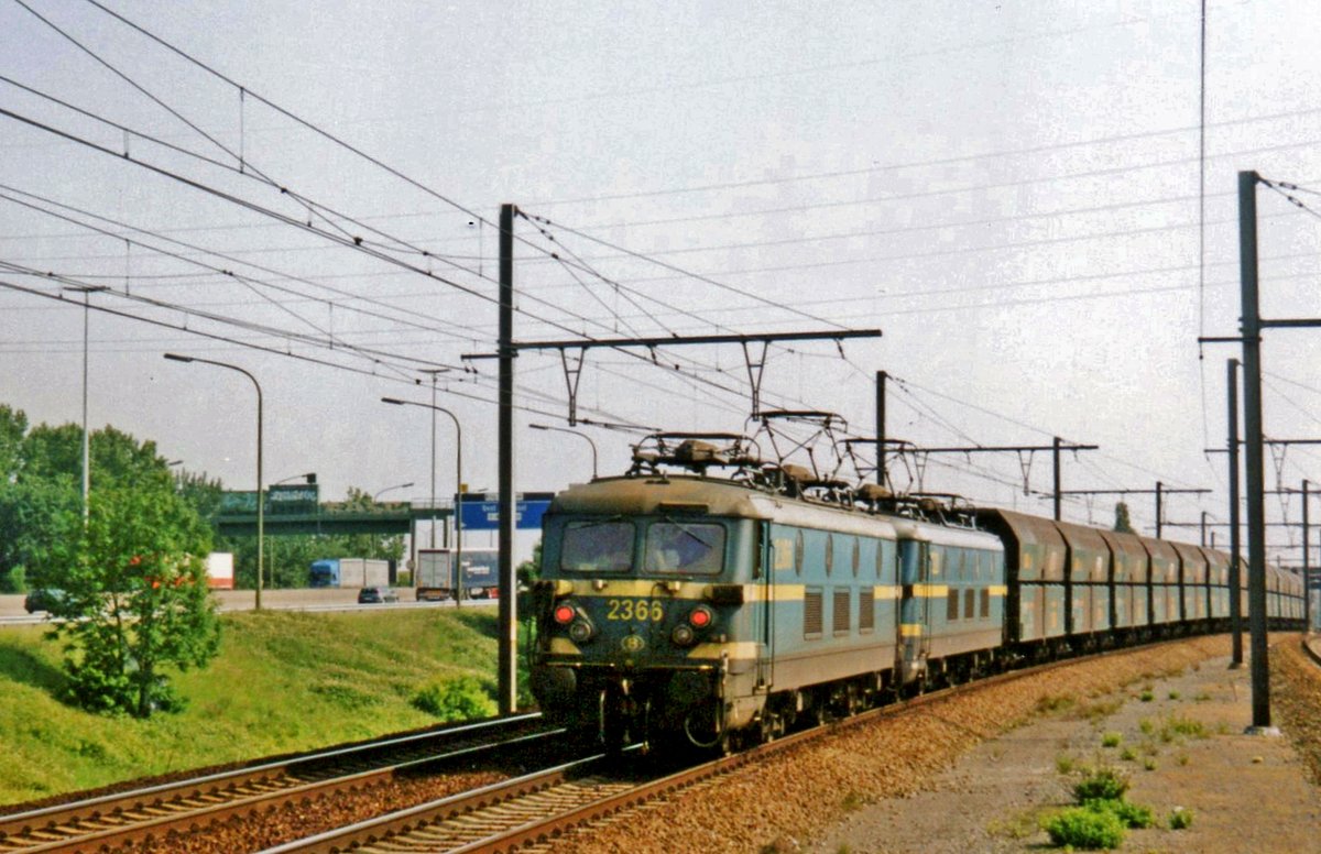 Double banker! NMBS 2366 is the second of two banking engines at the rear end of a somewhat overheavy coal train passing through Antwerpen-Luchtbal on 13 June 2006.