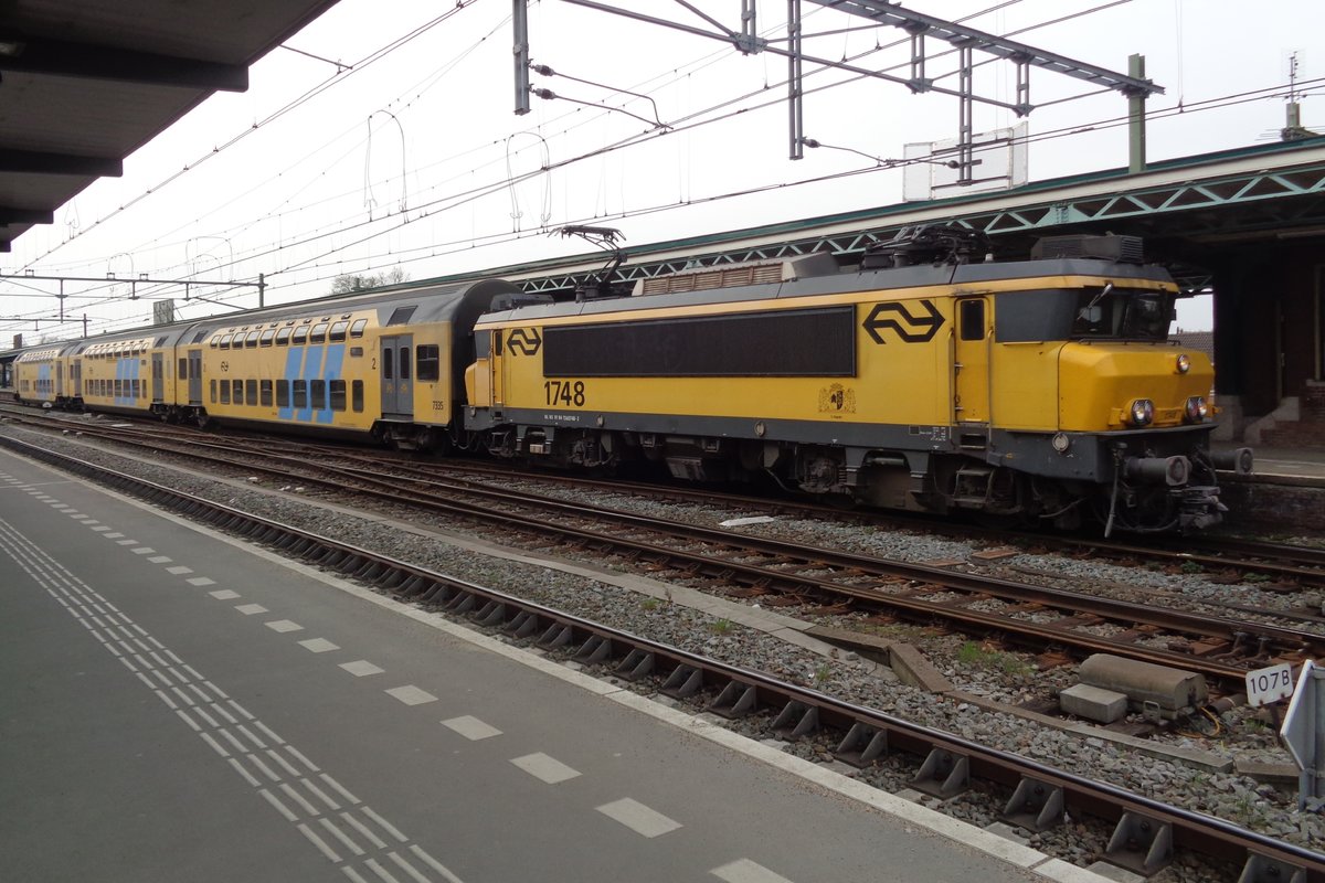 Double deck regional stock with 1748 stands at Deventer on 19 April 2018.