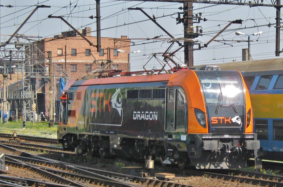 Draconian measures at Leszno on 1 May 2011, with STK E6ACT-001 'Dragon' passing by.