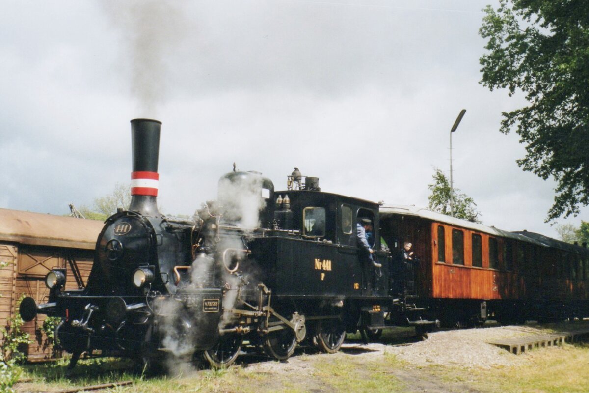 DSB 441 is about to haul a steam shuttle train from the work shop at Randers toward Randers station on 23 May 2004 during a festive weekend.