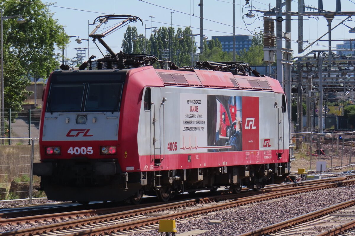 During a run by CFL 4005 advertises against stupid acting at or near railway crossing in Luxembourg gare on 20 August 2023.