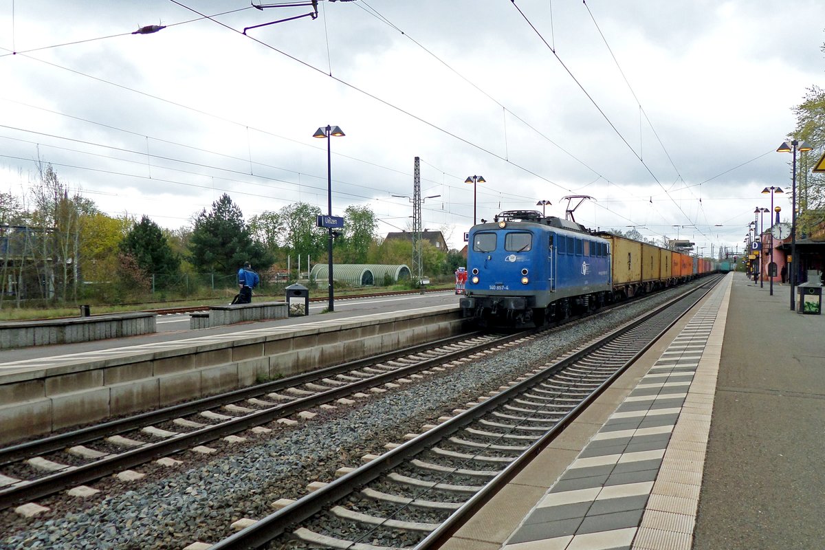 EGP 140 857 hauls one of many container trains ghtrough Uelzen on a grey and rainy 28 April 2016.
