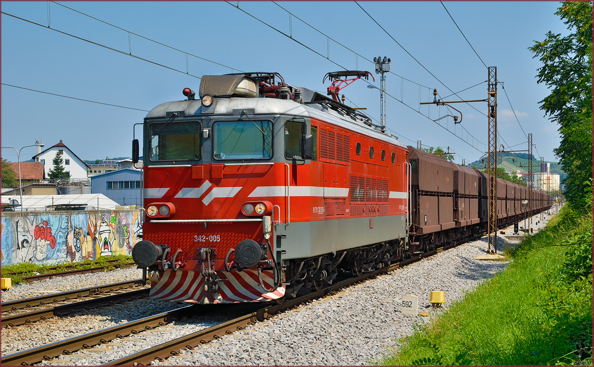 Electric loc 342-005 pull freight train through Maribor-Tabor on the way to Koper port. /18.7.2014